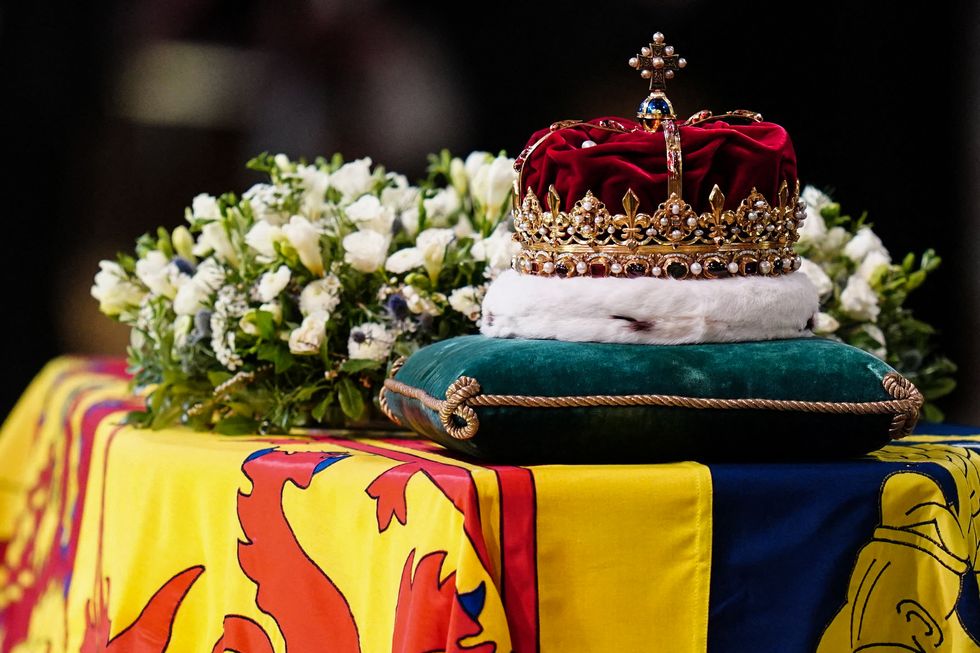 the crown of scotland sits atop the coffin of queen elizabeth ii inside st giles cathedral in edinburgh on september 12, 2022, during a service of thanksgiving for her life   mourners will on monday get the first opportunity to pay respects before the coffin of queen elizabeth ii, as it lies in an edinburgh cathedral where king charles iii will preside over a vigil photo by jane barlow  pool  afp photo by jane barlowpoolafp via getty images