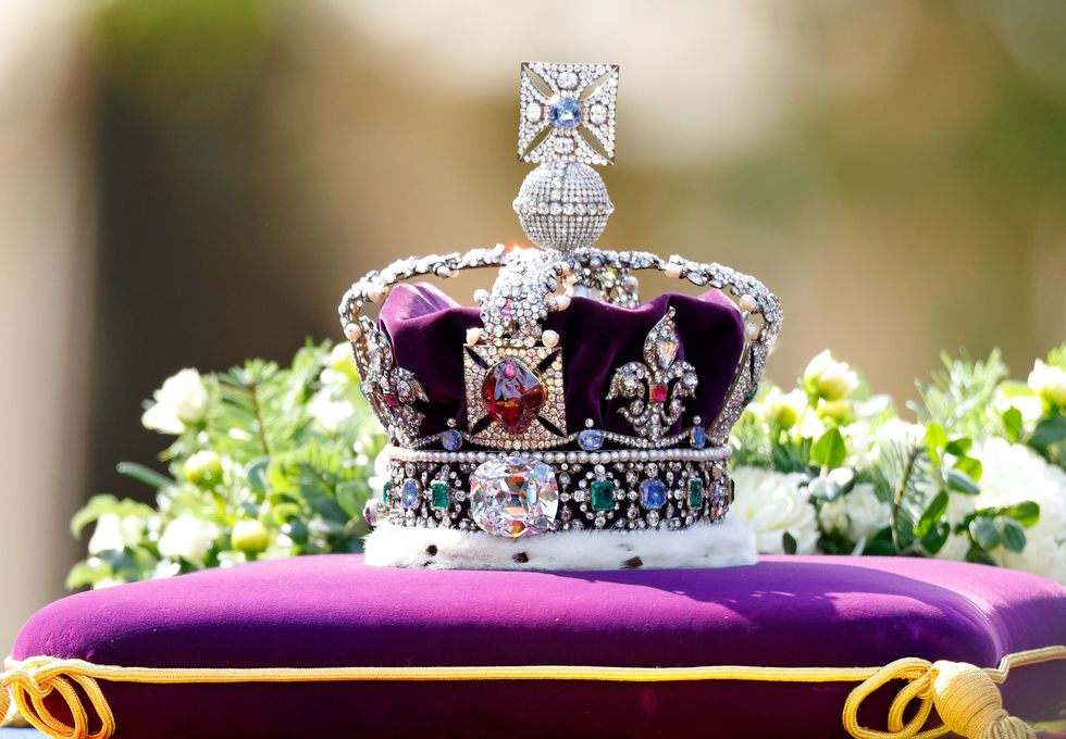 london, united kingdom   september 14 embargoed for publication in uk newspapers until 24 hours after create date and time the imperial state crown sits on top of queen elizabeth iis coffin as it is transported on a gun carriage from buckingham palace to the palace of westminster ahead of her lying in state on september 14, 2022 in london, united kingdom queen elizabeth iis coffin is taken in procession on a gun carriage of the kings troop royal horse artillery from buckingham palace to westminster hall where she will lay in state until the early morning of her funeral queen elizabeth ii died at balmoral castle in scotland on september 8, 2022, and is succeeded by her eldest son, king charles iii photo by max mumbyindigogetty images
