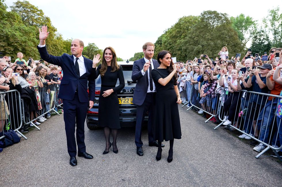 windsor, england   september 10 catherine, princess of wales, prince william, prince of wales, prince harry, duke of sussex, and meghan, duchess of sussex wave to crowd on the long walk at windsor castle on september 10, 2022 in windsor, england crowds have gathered and tributes left at the gates of windsor castle to queen elizabeth ii, who died at balmoral castle on 8 september, 2022 photo by chris jackson   wpa poolgetty images