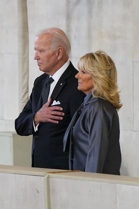 london, england   september 18 us president joe biden gestures next to first lady jill biden as they view the coffin of queen elizabeth ii lying in state at westminster hall on september 18, 2022 in london, england members of the public are able to pay respects to her majesty queen elizabeth ii for 23 hours a day from 1700 on september 18, 2022 until 0630 on september 19, 2022  queen elizabeth ii died at balmoral castle in scotland on september 8, 2022, and is succeeded by her eldest son, king charles iii photo by joe giddens wpa poolgetty images