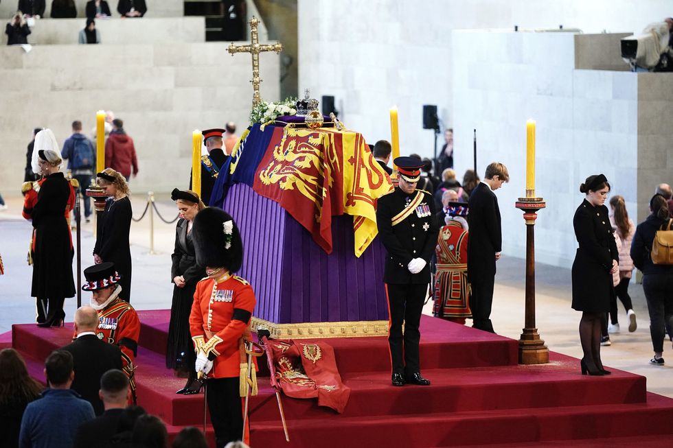 queen elizabeth ii s grandchildren l r zara tindall, britains lady louise windsor, britains princess beatrice of york, britains prince william, prince of wales, britains prince harry, duke of sussex, britains princess eugenie of york, james, viscount severn and peter phillips hold a vigil around the coffin of queen elizabeth ii, draped in the royal standard with the imperial state crown and the sovereigns orb and sceptre, lying in state on the catafalque in westminster hall, at the palace of westminster in london on september 17, 2022, ahead of her funeral on monday   queen elizabeth ii will lie in state in westminster hall inside the palace of westminster, until 0530 gmt on september 19, a few hours before her funeral, with huge queues expected to file past her coffin to pay their respects photo by aaron chown  pool  afp photo by aaron chownpoolafp via getty images