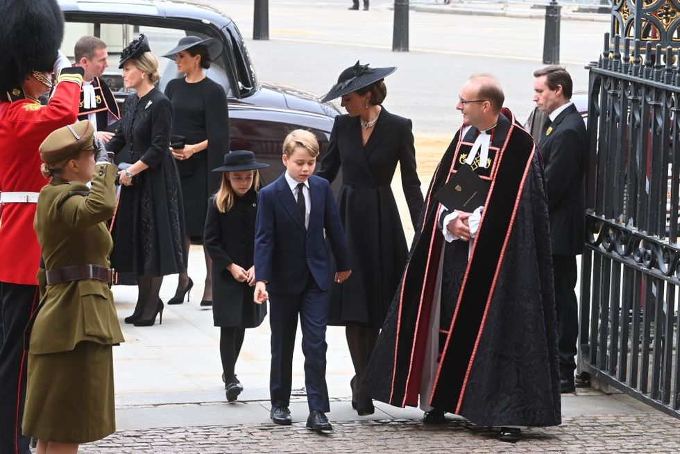 london, england   september 19 princess charlotte of wales, prince george of wales and catherine, princess of wales walk behind the queens funeral cortege borne on the state gun carriage of the royal navy as it proceeds towards westminster abbey on september 19, 2022 in london, england elizabeth alexandra mary windsor was born in bruton street, mayfair, london on 21 april 1926 she married prince philip in 1947 and ascended the throne of the united kingdom and commonwealth on 6 february 1952 after the death of her father, king george vi queen elizabeth ii died at balmoral castle in scotland on september 8, 2022, and is succeeded by her eldest son, king charles iii photo by geoff pugh   wpa poolgetty images