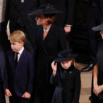 london, england   september 19 catherine, princess of wales, princess charlotte of wales, prince george of wales and meghan, duchess of sussex arrive at westminster abbey for the state funeral of queen elizabeth ii on september 19, 2022 in london, england  elizabeth alexandra mary windsor was born in bruton street, mayfair, london on 21 april 1926 she married prince philip in 1947 and ascended the throne of the united kingdom and commonwealth on 6 february 1952 after the death of her father, king george vi queen elizabeth ii died at balmoral castle in scotland on september 8, 2022, and is succeeded by her eldest son, king charles iii photo by phil noble   wpa poolgetty images