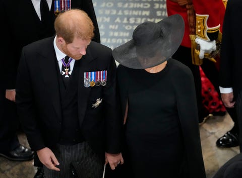 london, england   september 19 prince harry, duke of sussex and meghan, the duchess of sussex follow the coffin of queen elizabeth ii as it is carried out of westminster abbey after the state funeral on september 19, 2022 in london, england elizabeth alexandra mary windsor was born in bruton street, mayfair, london on 21 april 1926 she married prince philip in 1947 and ascended the throne of the united kingdom and commonwealth on 6 february 1952 after the death of her father, king george vi queen elizabeth ii died at balmoral castle in scotland on september 8, 2022, and is succeeded by her eldest son, king charles iii photo by frank augstein   wpa poolgetty images