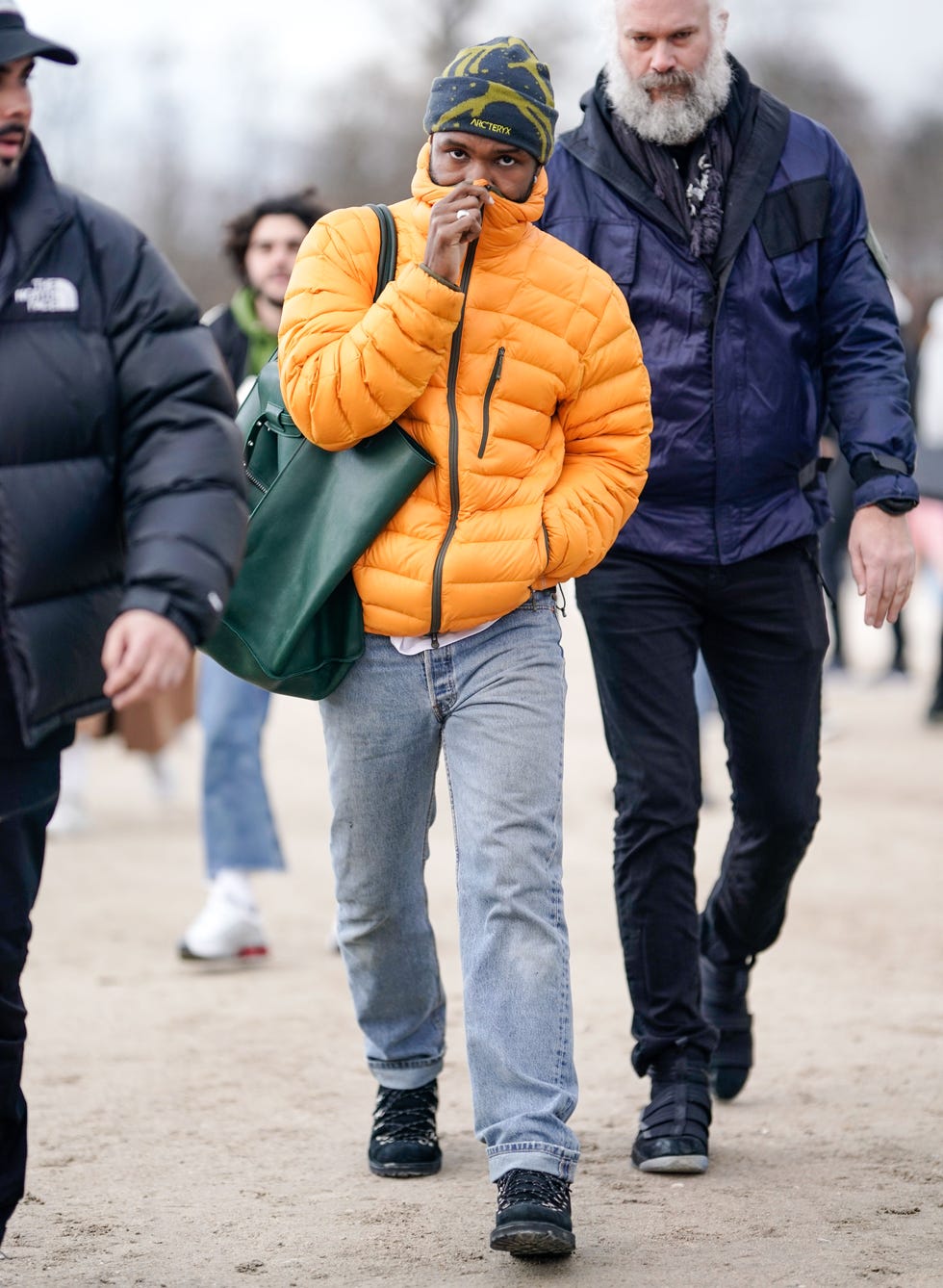 paris, france   january 17 frank ocean wears an orange puffer jacket, a beanie hat from arcteryx, outside louis vuitton, during paris fashion week   menswear fw 2019 2020,  on january 17, 2019 in paris, france photo by edward berthelotgetty images