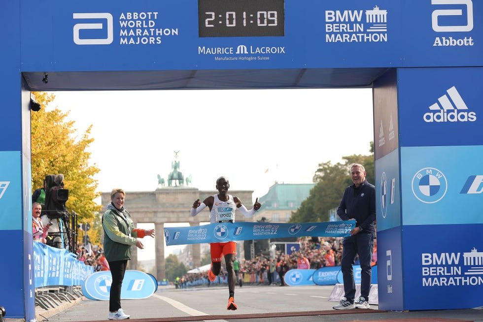 berlin, germany   september 25 eliud kipchoge of kenya crosses the finish line of the 2022 bmw berlin marathon in a new wolrd record time of 20109 h on september 25, 2022 in berlin, germany photo by alexander hassensteingetty images