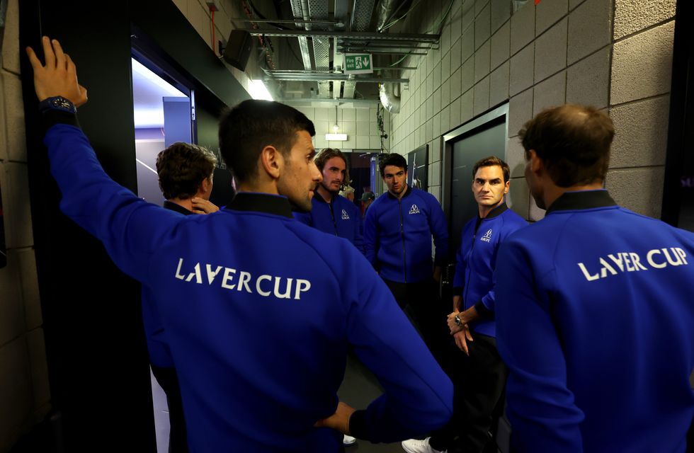 london, england   september 23 roger federer speaks with stefanos tsitsipas and matteo berrettini of team europe during day one of the laver cup at the o2 arena on september 23, 2022 in london, england photo by clive brunskillgetty images for laver cup