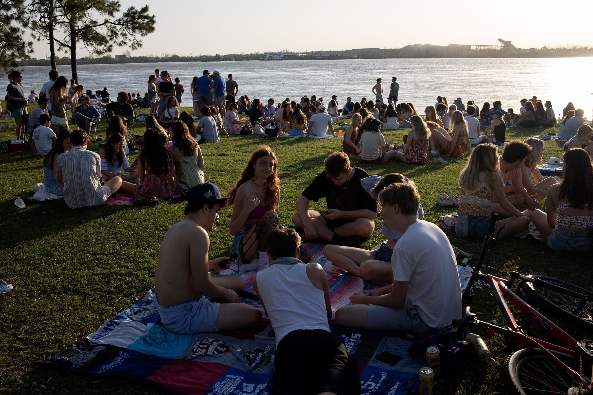 college students from tulane spend friday evening socializing on the banks of the mississippi river on march 18, 2022 in new orleans, louisiana