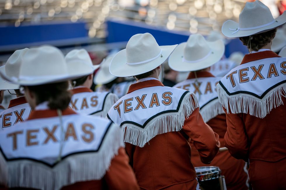 dallas, tx   october 12 texas longhorns student band arrives on field for the big 12 red river showdown game against the oklahoma sooners on october 12, 2019 at cotton bowl stadium in dallas, texas photo by william purnellicon sportswire via getty images