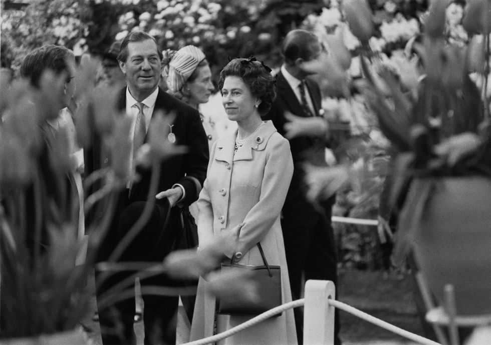 queen elizabeth ii and prince philip, duke of edinburgh visit the chelsea flower show in london, england, 1973 photo by expresshulton archivegetty images