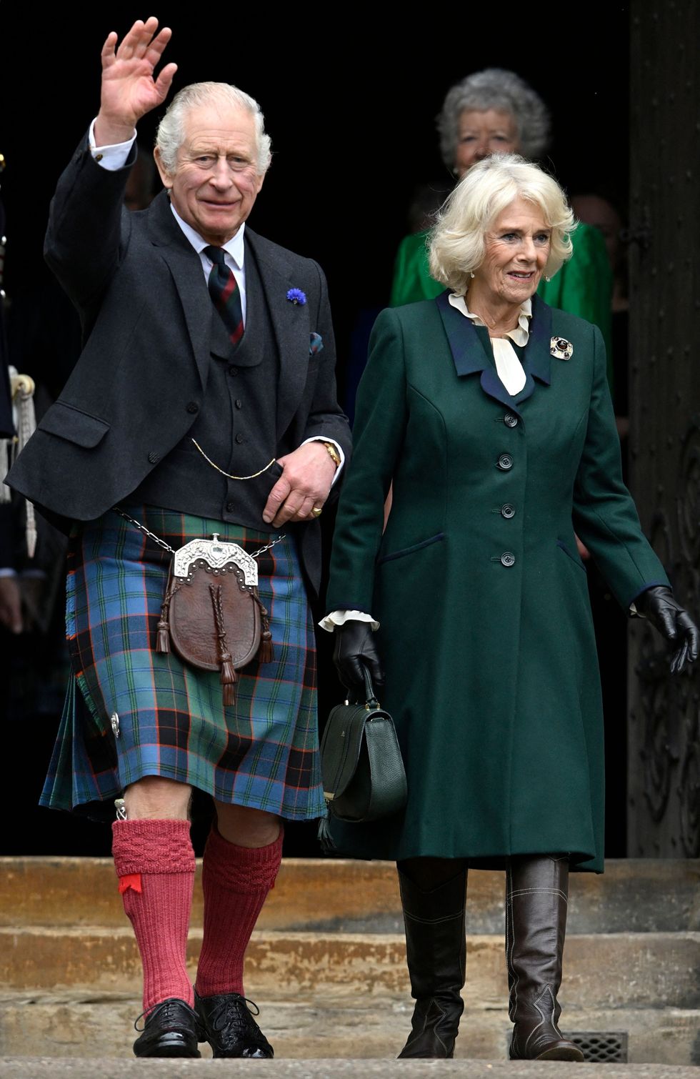 britains king charles iii and britains camilla, queen consort wave as they walk to meet members of the public after leaving from city chambers to dunfermline abbey in dunfermline in south east scotland on october 3, 2022 photo by neil hanna  afp photo by neil hannaafp via getty images