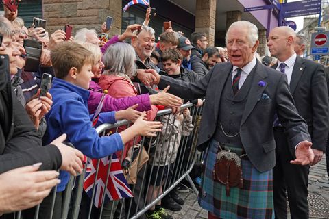 fife, scotland   october 03 king charles iii greets members of the public as he arrives at an official council meeting at the city chambers in dunfermline, fife, to formally mark the conferral of city status on the former town, ahead of a visit to dunfermline abbey to mark its 950th anniversary on october 3, 2022 in fife, scotland photo by  andrew milligan   poolgetty images