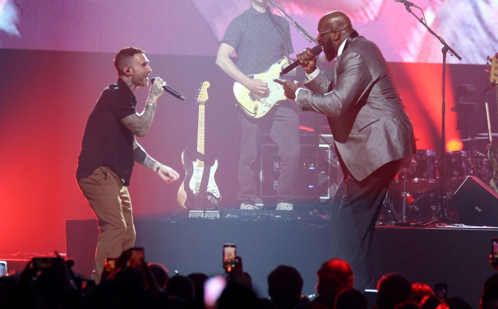 las vegas, nevada   october 01 singer adam levine l of maroon 5 and shaquille oneal perform during the event hosted by the shaquille oneal foundation at mgm grand garden arena on october 01, 2022 in las vegas, nevada photo by gabe ginsberggetty images for the shaquille oneal foundation
