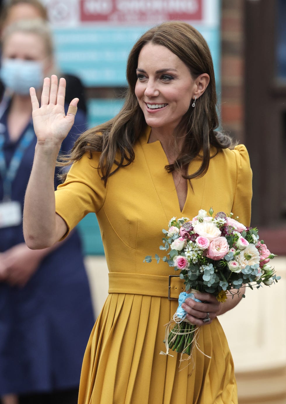 Kate Middleton Wore a Stunning Gold Pleated Dress to Royal Surrey