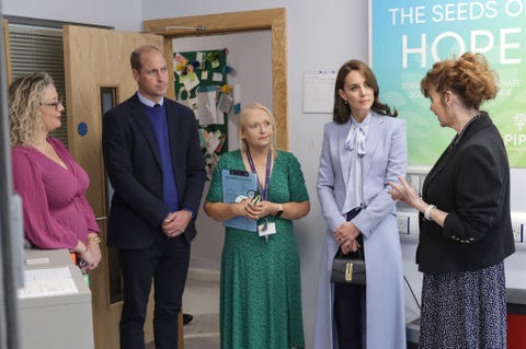 belfast, northern ireland october 06 prince william, prince of wales second left and catherine, princess of wales second right speak with staff and counsellors during their visit to the pips public initiative for prevention of suicide and self harm charity on october 06, 2022 in belfast, northern ireland photo by chris jackson poolgetty images