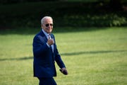 washington, dc   july 20 us president joe biden gestures toward reporters as he departs marine one and walks to the oval office on the south lawn of the white house july 20, 2022 in washington, dc biden traveled to somerset, massachusetts to discuss his next steps on addressing climate change he delivered remarks at the site of the now closed brayton point power plant, which is being turned into the states first offshore wind manufacturing facility photo by drew angerergetty images