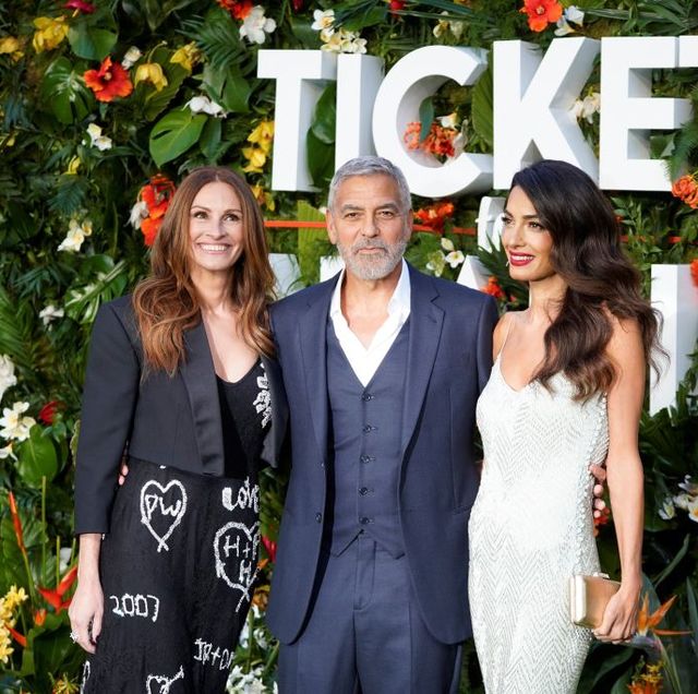 us actor george clooney c and his wife lebanese british barrister amal clooney r pose with us actress julia roberts on the red carpet upon arrival to attend the world premiere of the film ticket to paradise in central london on september 7, 2022 photo by niklas hallen  afp photo by niklas hallenafp via getty images