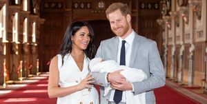 windsor, england   may 08 prince harry, duke of sussex and meghan, duchess of sussex, pose with their newborn son archie harrison mountbatten windsor during a photocall in st georges hall at windsor castle on may 8, 2019 in windsor, england the duchess of sussex gave birth at 0526 on monday 06 may, 2019 photo by dominic lipinski   wpa poolgetty images