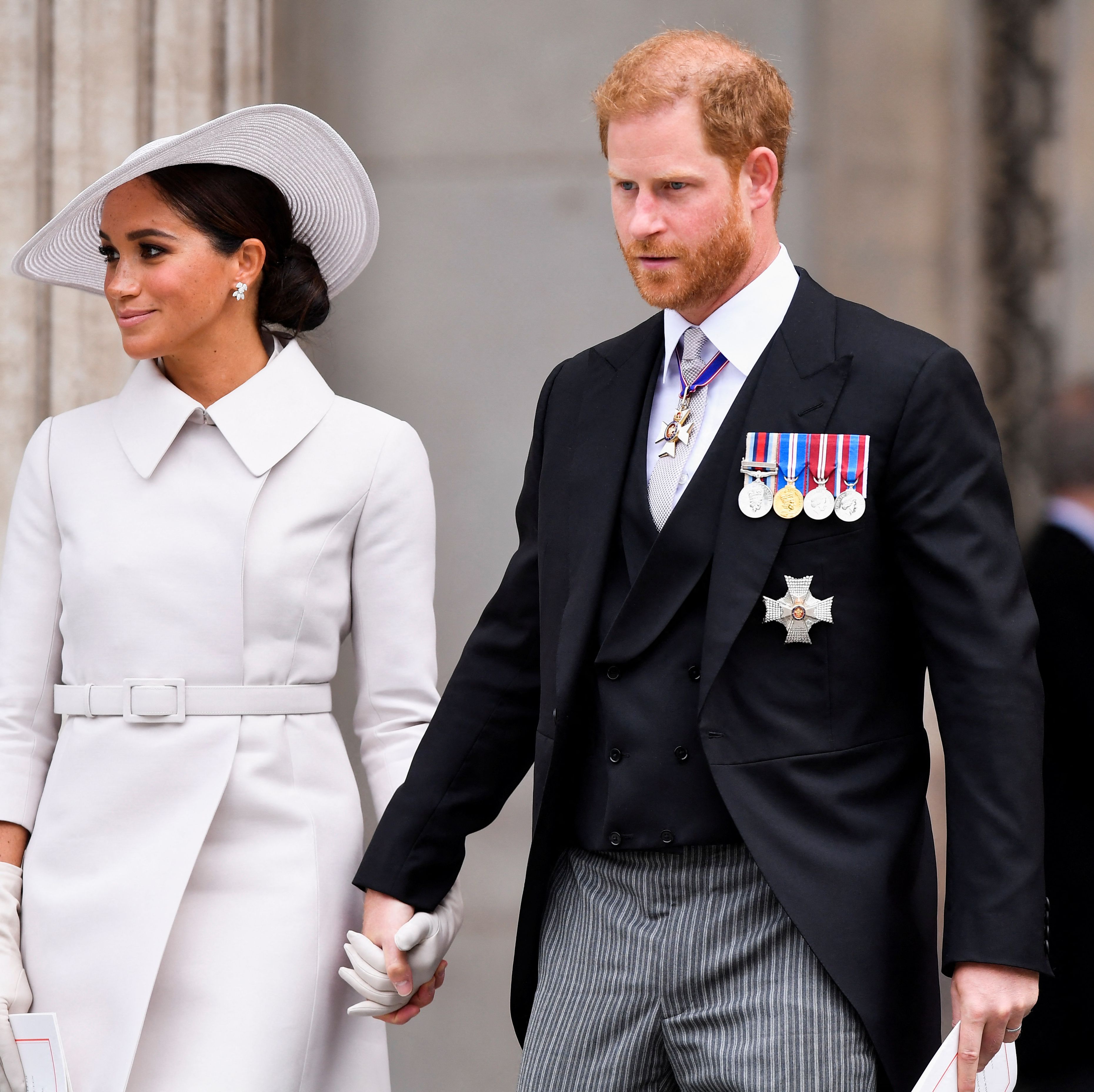 The coronation is taking place on another big day for the couple—but a royal expert swears it's not a snub.