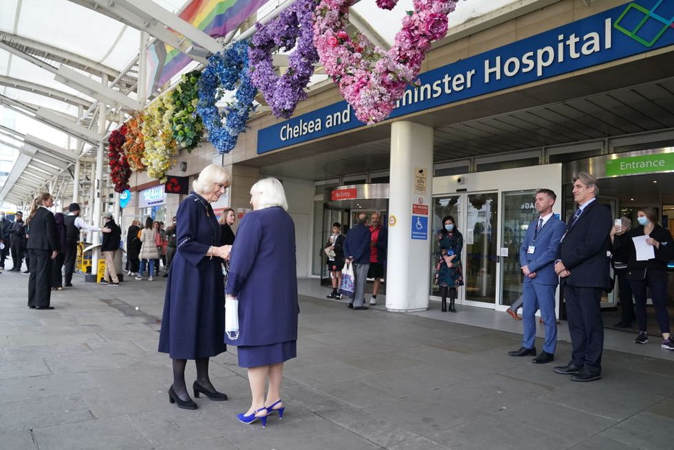 london, england   october 13 camilla, queen consort l is greeted by colonel jane davis, vice lieutenant of greater london, as she arrives for a visit to a maternity unit at chelsea and westminster hospital in london to meet key domestic abuse frontline staff on october 13, 2022 in london, england the maternity ward acts as one of the key hubs for women experiencing domestic abuse photo by kirsty oconnor   wpa poolgetty images