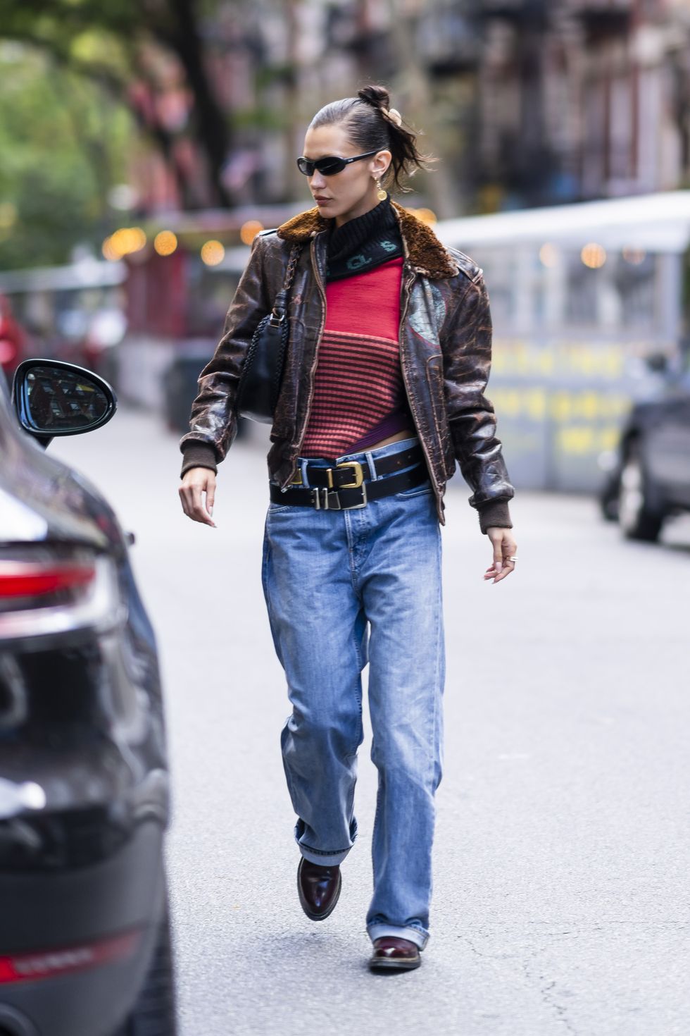 Maroon ribbed leather pants and leather top ensemble