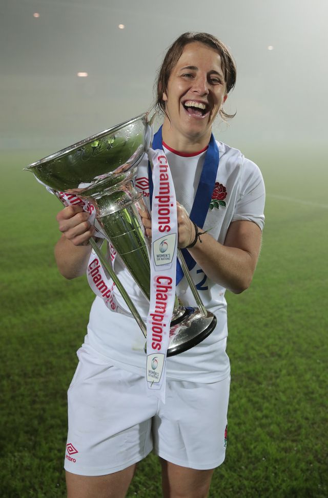 parma, italy   november 01  katy daley mclean of england celebrates with the 6 nations trophy after winning the grand slam during the women's six nations match between italy and england on november 01, 2020 in parma, italy football stadiums around europe remain empty due to the coronavirus pandemic as government social distancing laws prohibit fans inside venues resulting in fixtures being played behind closed doors photo by emilio andreoligetty images