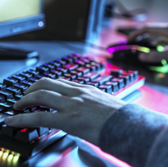 teenage boy using keyboard and mouse