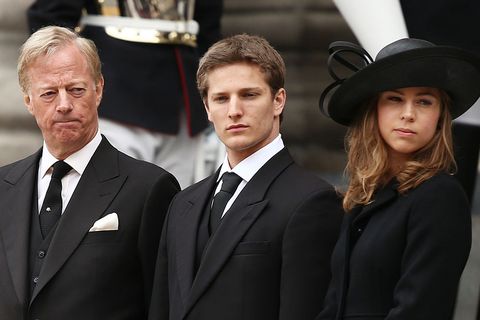 london, england   april 17  mark thatcher, michael thatcher and amanda thatcher look on from the steps of st pauls cathedral as the coffin is placed in the hearse after the ceremonial funeral of former british prime minister baroness thatcher at st pauls cathedral on april 17, 2013 in london, england dignitaries from around the world today join queen elizabeth ii and prince philip, duke of edinburgh as the united kingdom pays tribute to former prime minister baroness thatcher during a ceremonial funeral with military honours at st pauls cathedral lady thatcher, who died last week, was the first british female prime minister and served from 1979 to 1990  photo by dan kitwoodgetty images