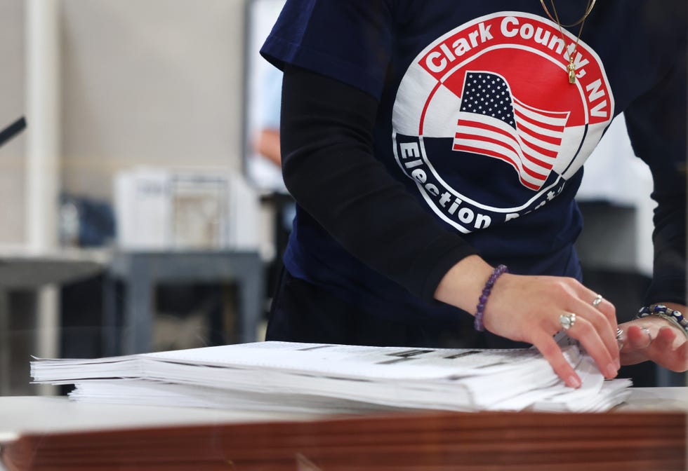 north las vegas, nevada   november 09 a clark county election department worker sorts ballots in the tabulation area at the clark county election department during the ongoing election process on november 9, 2022 in north las vegas, nevada one day after the midterm elections, nevada election officials continue counting votes in state races  photo by mario tamagetty images