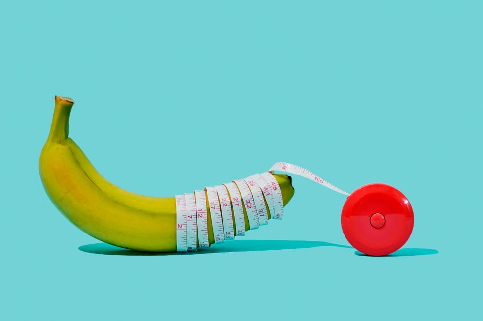 a banana with a measuring tape around it on a blue background, depicting the concept of penis measures