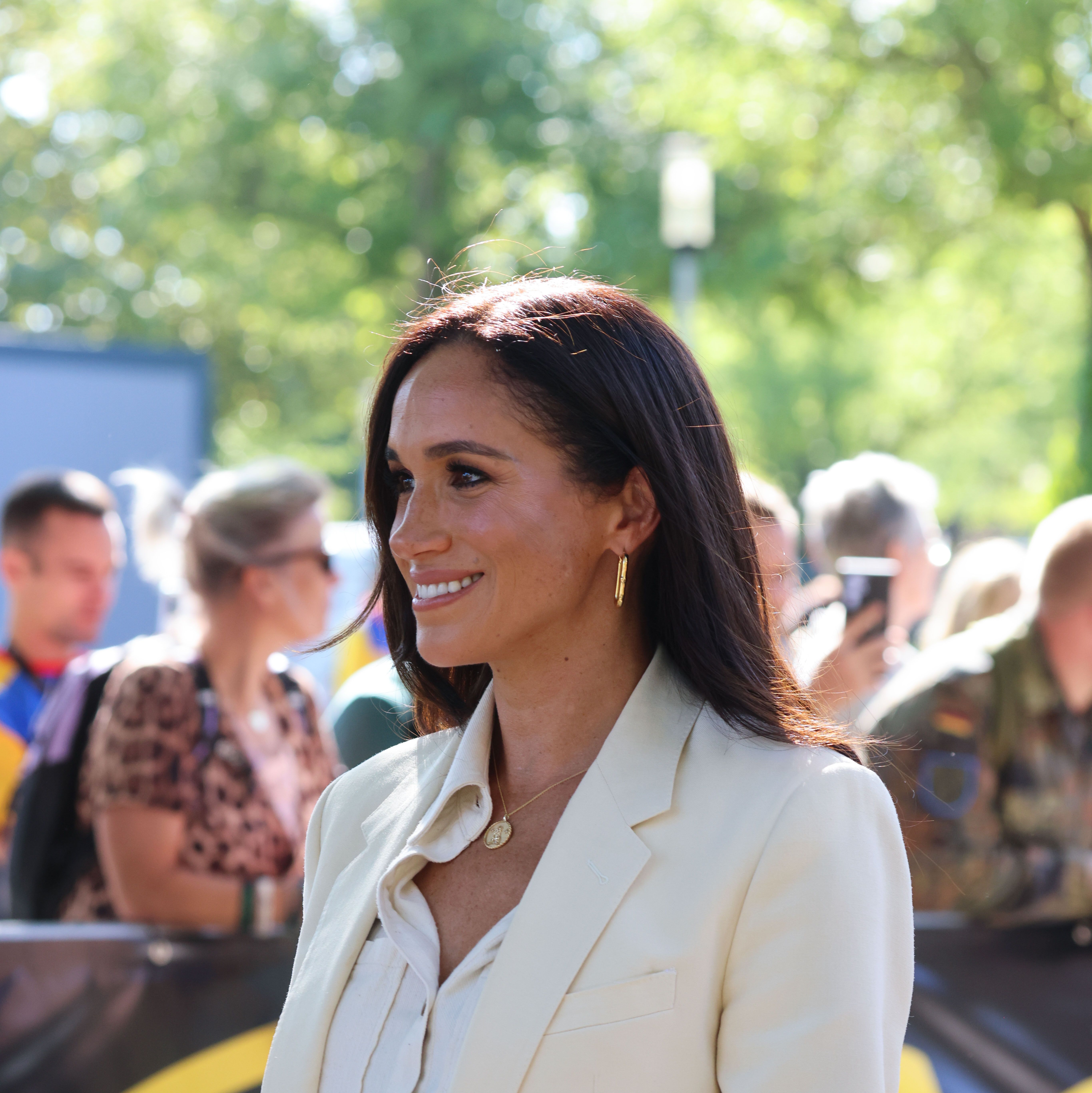 A source spoke out about Meghan's career plans hours before a candid photo of her out in Los Angeles was released.
