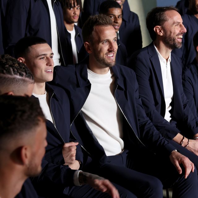 burton upon trent, england   november 14 phil foden, harry kane of england, gareth southgate, manager of england and teammates of england smile during a photoshoot at st georges park on november 14, 2022 in burton upon trent, england photo by eddie keogh   the fa  marks  spencers via getty images