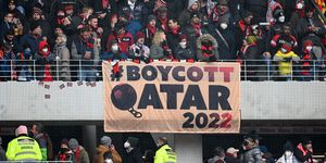 freiburg im breisgau, germany   april 02 fans of freiburg display a banner about boycotting the fifa world cup 2022 in qatar prior to the bundesliga match between sport club freiburg and fc bayern münchen at europa park stadion on april 02, 2022 in freiburg im breisgau, germany photo by matthias hangstgetty images