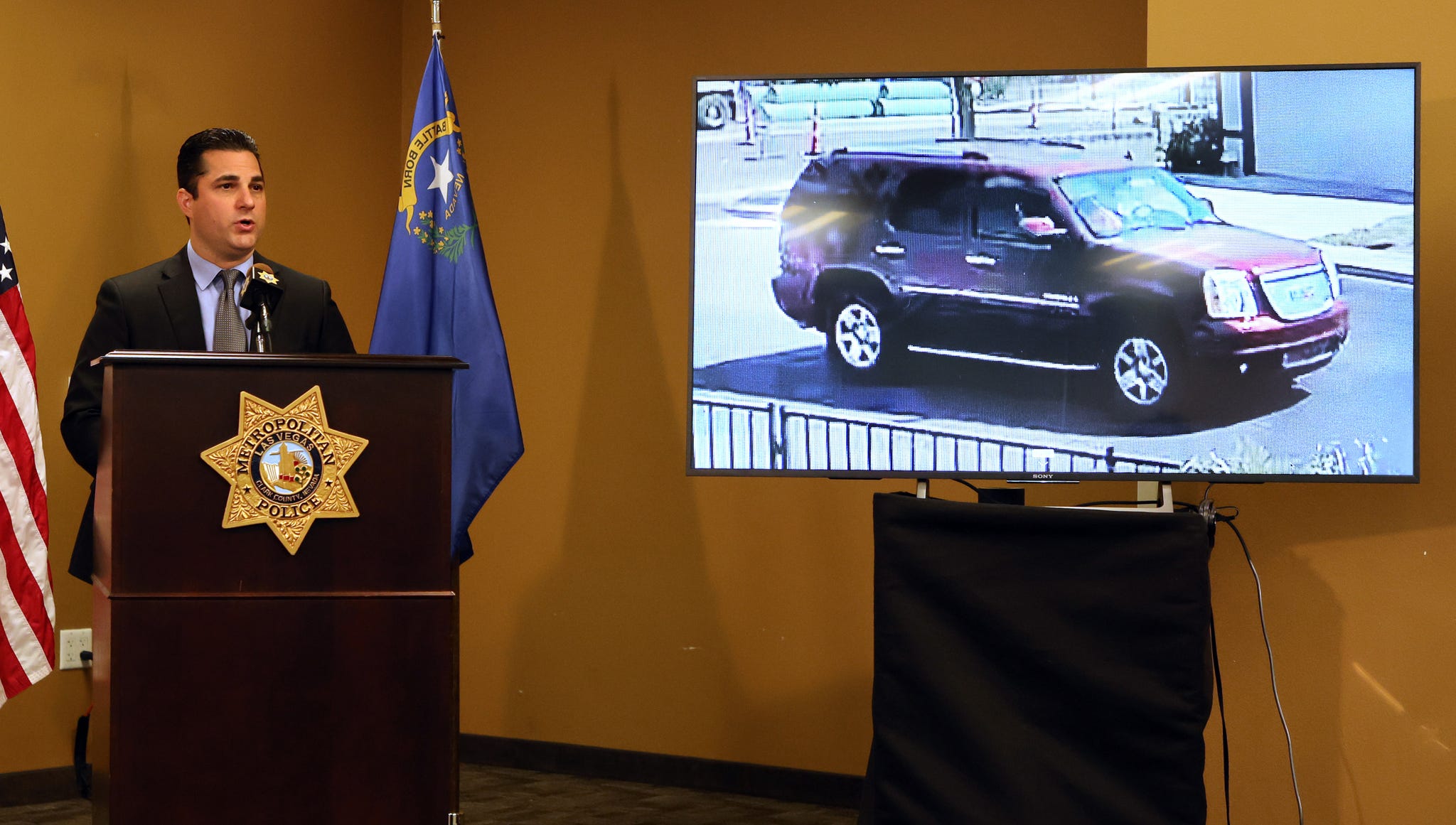 las vegas, nevada   september 08 las vegas metropolitan police department capt dori koren speaks at a news conference at the lvmpd headquarters to brief media members on the arrest of clark county public administrator robert telles on the charge of open murder of las vegas review journal investigative reporter jeff german on september 08, 2022, in las vegas, nevada an image of what koren said is a gmc denali suv that was seen suspiciously driving around germans neighborhood on the morning of the murder, is shown on a television screen police had a denali towed from telles home yesterday police said german was stabbed to death outside his home on september 03, but his body was not found until the next day german recently reported for months on the turmoil surrounding telles oversight of the office, and the administrator subsequently lost his re election bid in junes primary election photo by ethan millergetty images