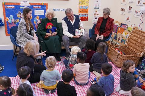 london, england   november 24 camilla, queen consort with madeleine harris l hugh bonneville 2nd r and karen jankel r the daughter of paddington author michael bond attend a special teddy bears picnic at a barnardo's nursery in bow on november 24, 2022 in london, england during the visit the queen consort personally delivered paddington bears and other cuddly toys that were left as tributes to queen elizabeth ii to children supported by the charity in 2016, her majesty queen elizabeth ii passed the patronage of barnardo's to the then duchess of cornwall photo by arthur edwards   wpa poolgetty images