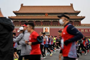 participants run past tiananmen square during the beijing marathon in the chinese capital on november 6, 2022 photo by jade gao  afp photo by jade gaoafp via getty images