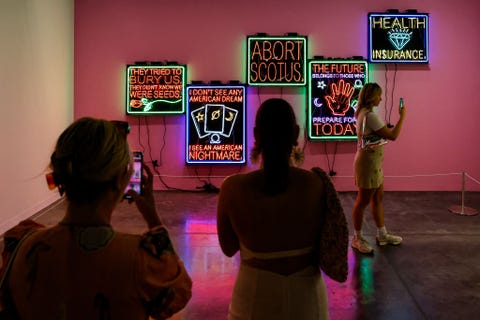 US-ART-EXHIBITION-SHOW people look at artwork during the miami art basel 2022 at the convention center in miami beach, florida, december 2, 2022 restricted to editorial use mandatory mention of the artist upon publication to illustrate the event as specified in the caption photo by eva marie uzcategui afp restricted to editorial use mandatory mention of the artist upon publication to illustrate the event as specified in the caption restricted to editorial use mandatory mention of the artist upon publication to illustrate the event as specified in the caption photo by eva marie uzcateguiafp via getty images