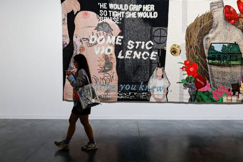 US-ART-EXHIBITION-SHOW people look at artwork during the miami art basel 2022 at the convention center in miami beach, florida, december 2, 2022 restricted to editorial use mandatory mention of the artist upon publication to illustrate the event as specified in the caption photo by eva marie uzcategui afp restricted to editorial use mandatory mention of the artist upon publication to illustrate the event as specified in the caption restricted to editorial use mandatory mention of the artist upon publication to illustrate the event as specified in the caption photo by eva marie uzcateguiafp via getty images