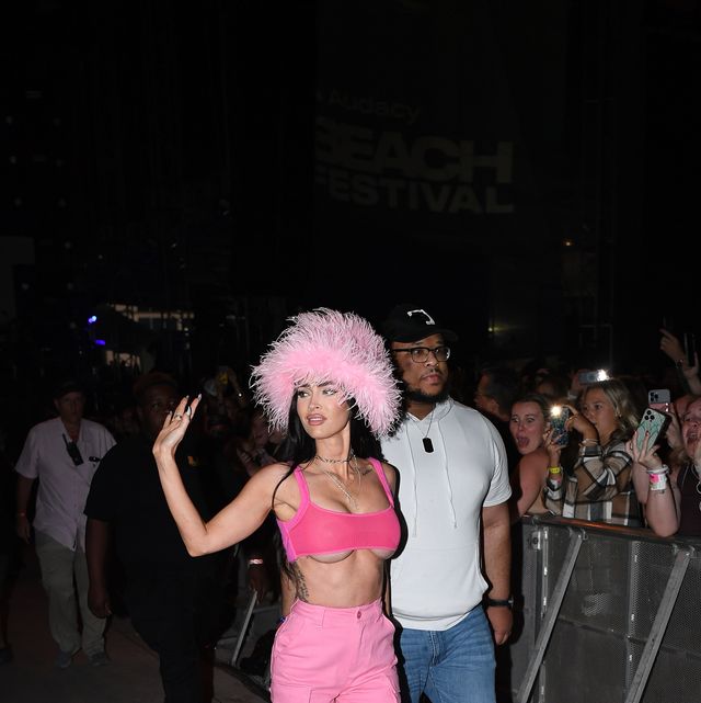 Megan Fox Pairs Gigantic Bucket Hat with Bralette That Flaunts