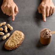 choosing natural protein or protein powder, male fingers pointing protein powder and natural protein peanuts