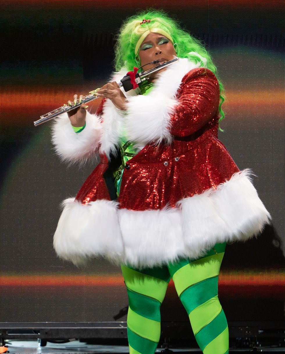 Lizzo is giving sexy Grinch cosplay in NYC in festive look