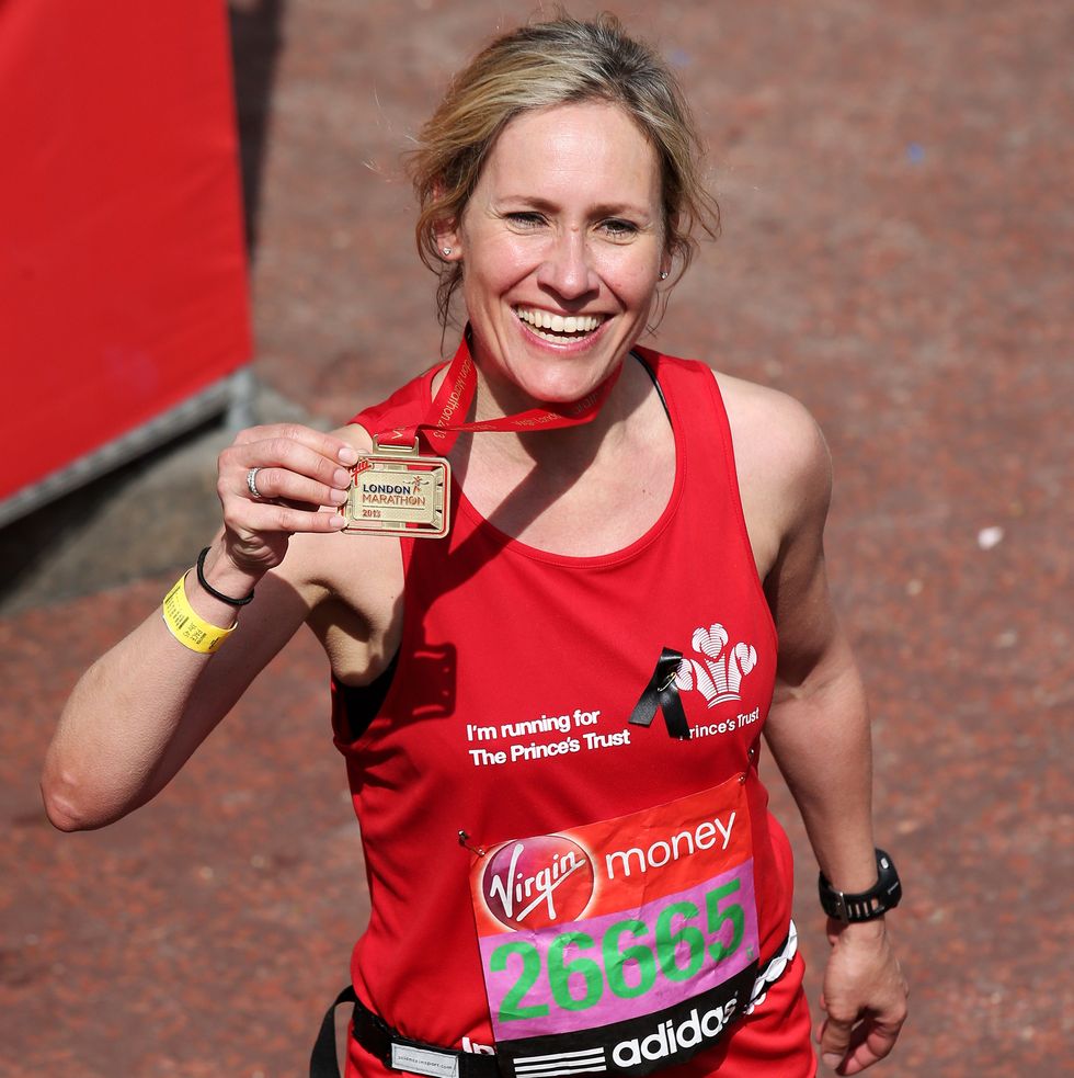 london, england april 21 bbc newsreader sophie raworth celebrates after crossing the finish line during the virgin london marathon 2013 on april 21, 2013 in london, england photo by chris jacksongetty images