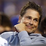 los angeles, california april 14 actor rob lowe attends a game between the cincinnati reds and the los angeles dodgers in the first inning during the opening series at dodger stadium on april 14, 2022 in los angeles, california photo by ronald martinezgetty images