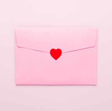 valentine's day puns envelope sealed with red heart sticker