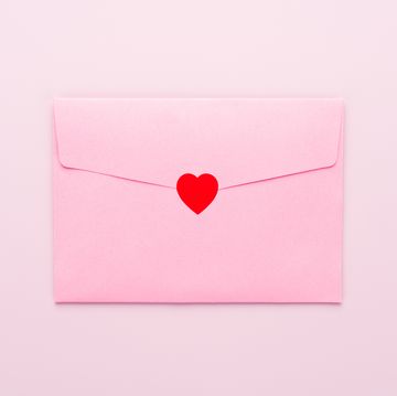 valentine's day puns envelope sealed with red heart sticker