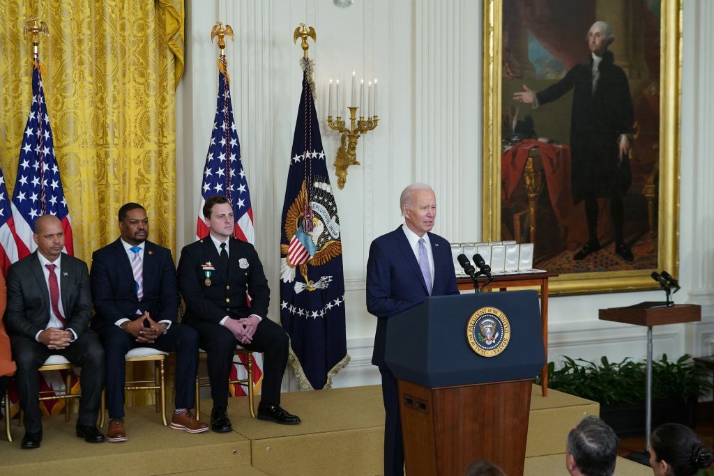 us president joe biden r speaks on the second anniversary of the january 6, 2021 attack on the us capitol, during a ceremony in the east room of the white house in washington, dc, on january 6, 2023 biden will award the presidential citizens medal to 12 people during the ceremony photo by mandel ngan afp photo by mandel nganafp via getty images