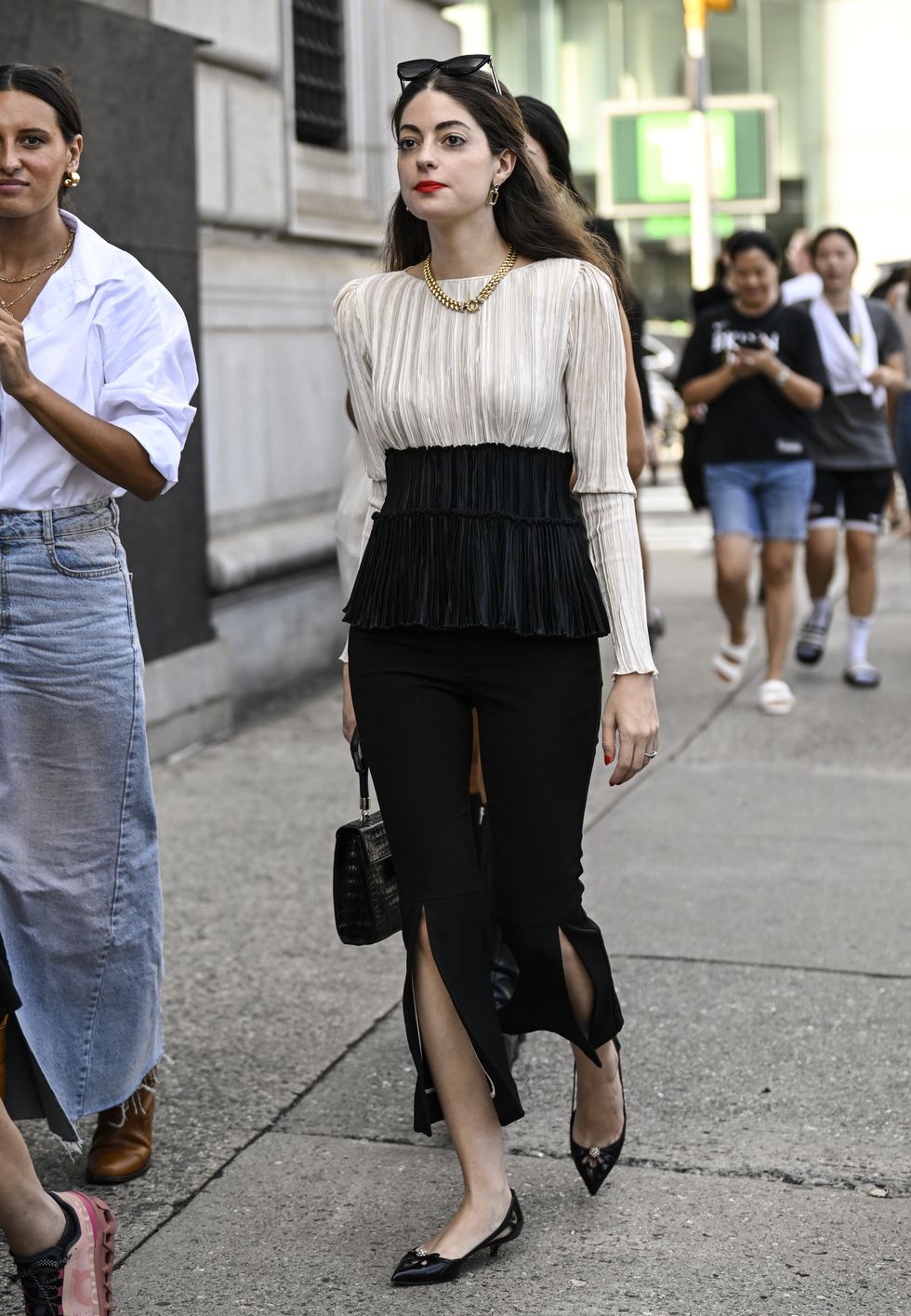 new york, new york september 10 lilah ramzi is seen wearing a cream top, black skirt, black shoes with a gold chain outside the 31 phillip lim show during nyfw ss 2024 on september 10, 2023 in new york city photo by daniel zuchnikgetty images