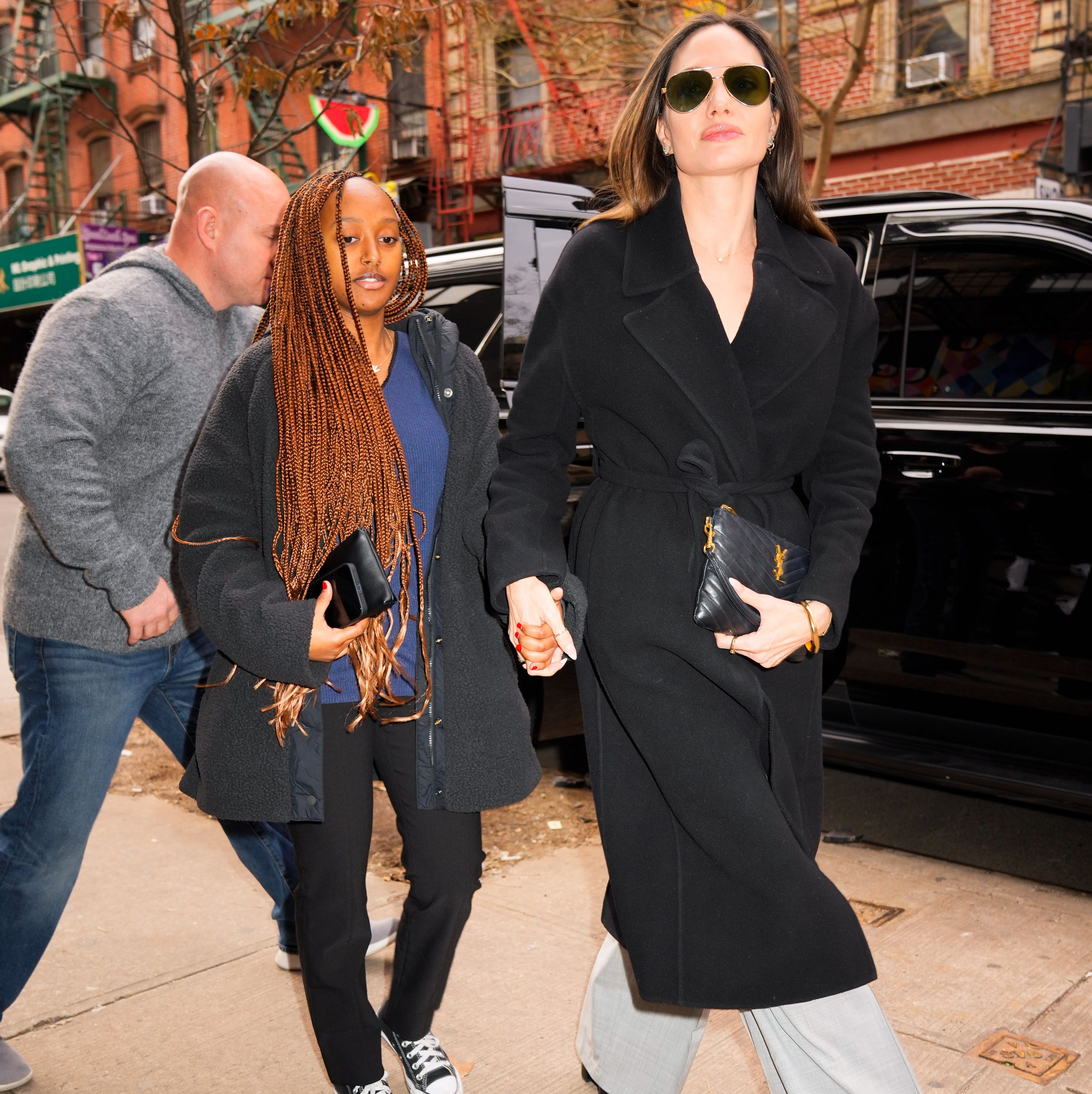 Angelina Jolie Bundles Up in a Luxurious Wrap Coat During Outing with Zahara