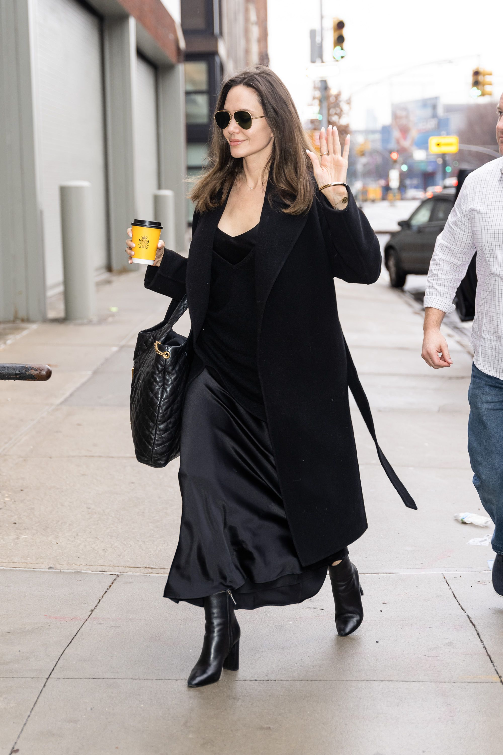 Smythson on X: Angelina Jolie carries the iconic 1887 bag in black    / X