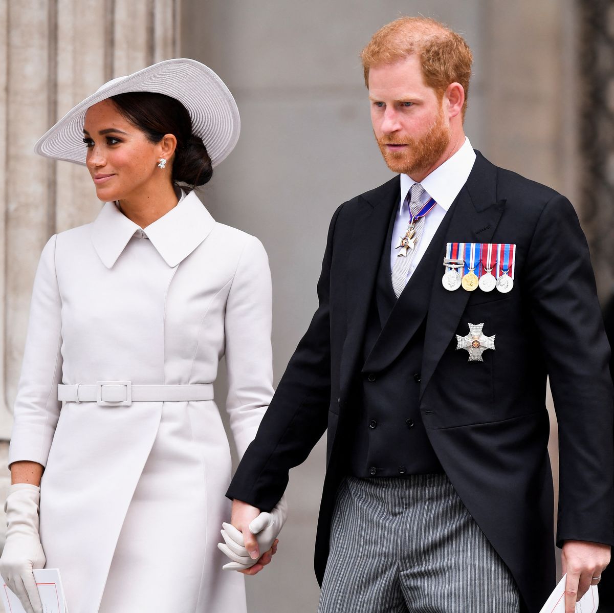 london, england june 03 prince harry, duke of sussex, and meghan, duchess of sussex after attending the national service of thanksgiving at st pauls cathedral during the queens platinum jubilee celebrations on june 3, 2022 in london, england the platinum jubilee of elizabeth ii is being celebrated from june 2 to june 5, 2022, in the uk and commonwealth to mark the 70th anniversary of the accession of queen elizabeth ii on 6 february 1952 photo by toby melville wpa poolgetty images
